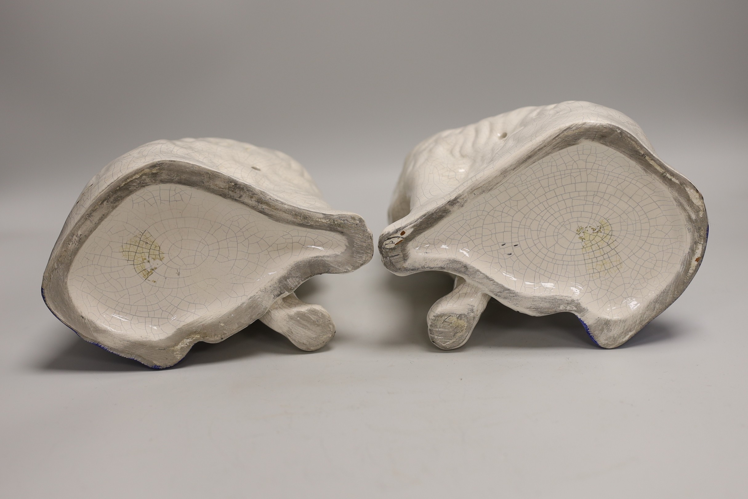A pair of Staffordshire style comforter spaniels and two other items